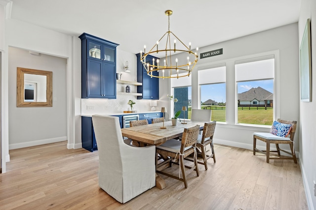 3201 Dovehill Dr, Northlake, TX 76247 - dining area with a chandelier, light wood-style floors, and baseboards