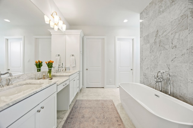 3201 Dovehill Dr, Northlake, TX 76247 - full bath with double vanity, a freestanding bath, recessed lighting, and tile walls