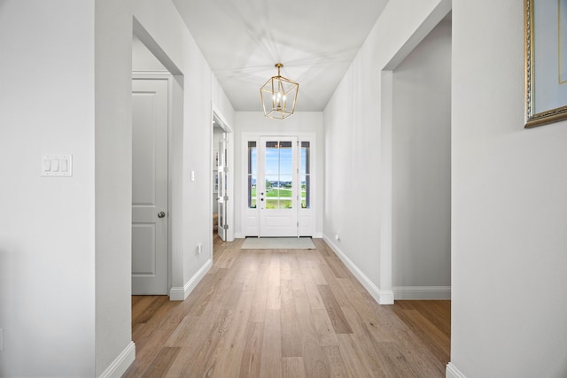3201 Dovehill Dr, Northlake, TX 76247 - foyer with wood finished floors, a chandelier, and baseboards