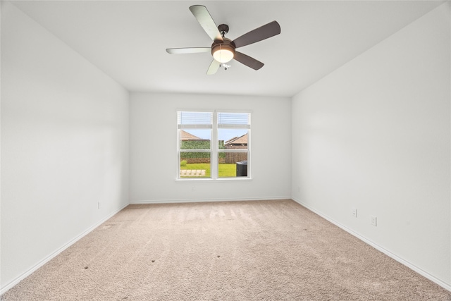 1028 W Dr, Aubrey, TX 76227 - empty room with light colored carpet, a ceiling fan, and baseboards