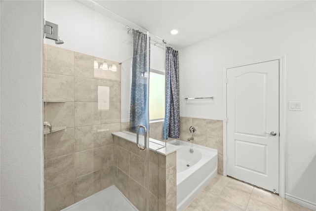 1028 W Dr, Aubrey, TX 76227 - bathroom with a shower stall, a bath, and tile patterned floors