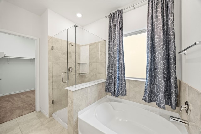 1028 W Dr, Aubrey, TX 76227 - bathroom with a stall shower, a garden tub, and a walk in closet