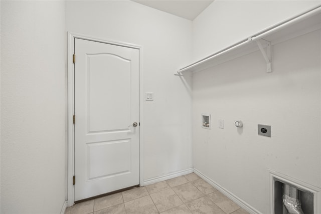 1028 W Dr, Aubrey, TX 76227 - laundry area with hookup for an electric dryer, hookup for a washing machine, baseboards, and hookup for a gas dryer
