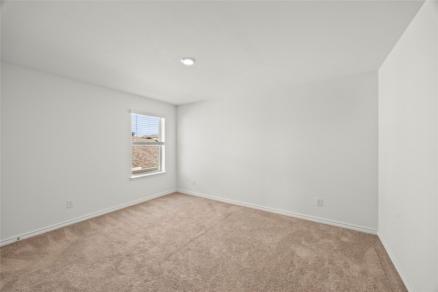 1028 W Dr, Aubrey, TX 76227 - empty room with light colored carpet and baseboards