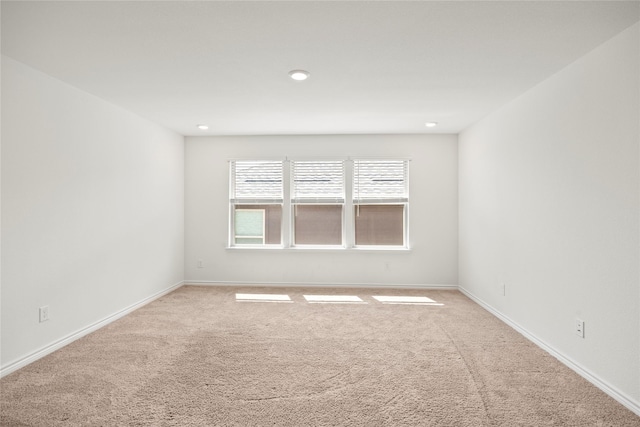 1028 W Dr, Aubrey, TX 76227 - spare room with carpet floors, baseboards, and recessed lighting