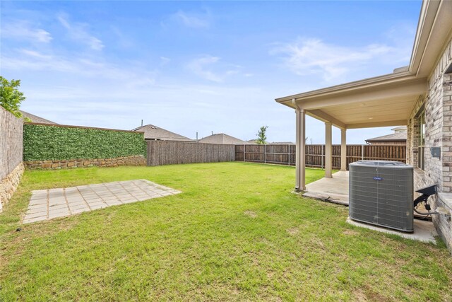 1028 W Dr, Aubrey, TX 76227 - view of yard with cooling unit and a patio