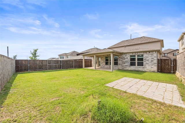 1028 W Dr, Aubrey, TX 76227 - rear view of house featuring a patio and brick siding