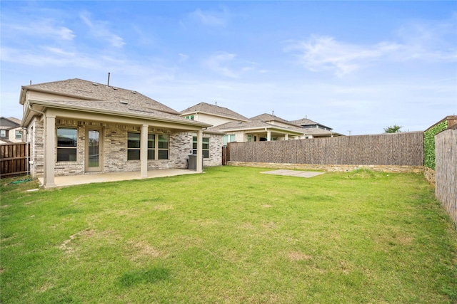 1028 W Dr, Aubrey, TX 76227 - rear view of property featuring a patio