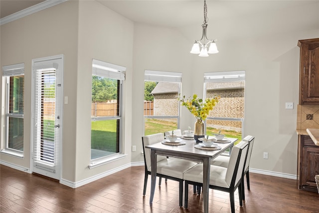 1825 Sanderlain Ln, Allen, TX 75002 - dining area featuring a chandelier, dark wood-type flooring, baseboards, and high vaulted ceiling