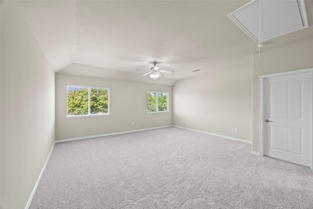 1825 Sanderlain Ln, Allen, TX 75002 - spare room with attic access, light carpet, baseboards, ceiling fan, and lofted ceiling