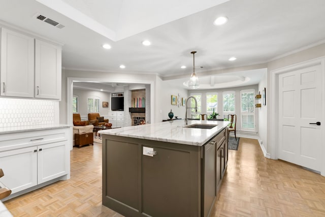 5701 Buffridge Trl, Dallas, TX 75252 - kitchen featuring a sink, recessed lighting, white cabinets, crown molding, and open floor plan