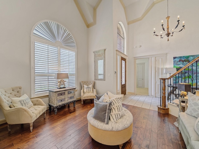 8009 Marathon Dr, Plano, TX 75024 - entryway featuring a chandelier, stairs, a high ceiling, and hardwood / wood-style flooring