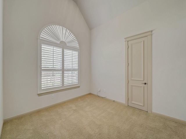 8009 Marathon Dr, Plano, TX 75024 - carpeted empty room with vaulted ceiling and baseboards