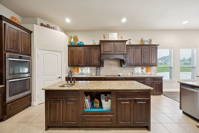235 Bearclaw Cir, Aledo, TX 76008 - kitchen featuring a sink, appliances with stainless steel finishes, light tile patterned floors, backsplash, and recessed lighting