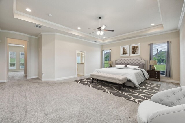 235 Bearclaw Cir, Aledo, TX 76008 - bedroom with a tray ceiling, multiple windows, light colored carpet, baseboards, and ornamental molding
