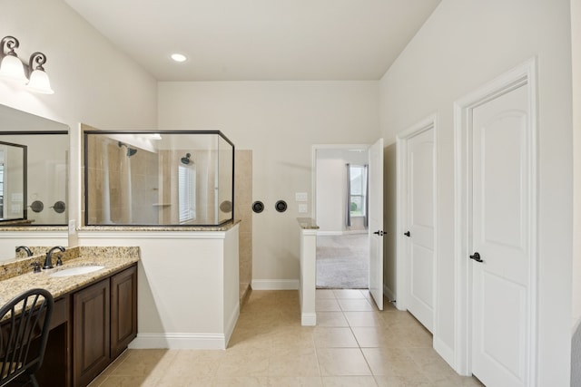 235 Bearclaw Cir, Aledo, TX 76008 - bathroom featuring walk in shower, vanity, tile patterned floors, and baseboards