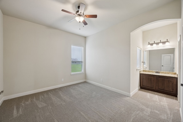 235 Bearclaw Cir, Aledo, TX 76008 - unfurnished bedroom with multiple windows, light carpet, a sink, and baseboards