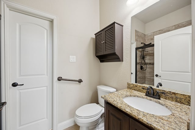 235 Bearclaw Cir, Aledo, TX 76008 - bathroom with vanity, a tile shower, and toilet