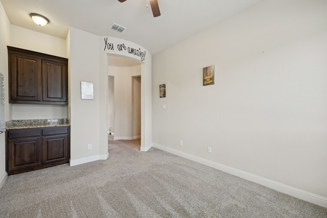 235 Bearclaw Cir, Aledo, TX 76008 - spare room with a ceiling fan, light colored carpet, and baseboards