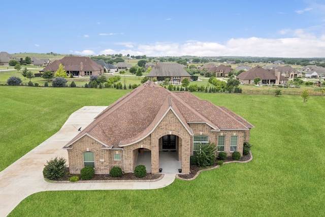235 Bearclaw Cir, Aledo, TX 76008 - view of front of home with a front lawn, brick siding, and a residential view