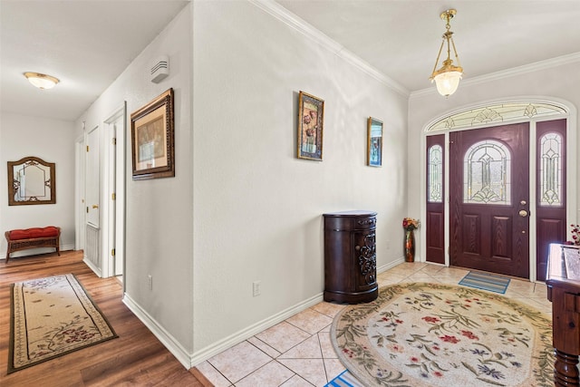 1419 Hinchliffe Rd, Mexia, TX 76667 - foyer entrance with baseboards, crown molding, and wood finished floors
