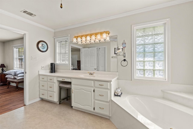 1419 Hinchliffe Rd, Mexia, TX 76667 - full bathroom with a garden tub, vanity, crown molding, and connected bathroom