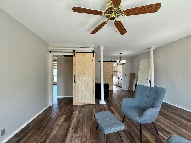 7830 Meadow Park Dr Unit 209, Dallas, TX 75230 - sitting room featuring a barn door, dark wood-style flooring, and baseboards
