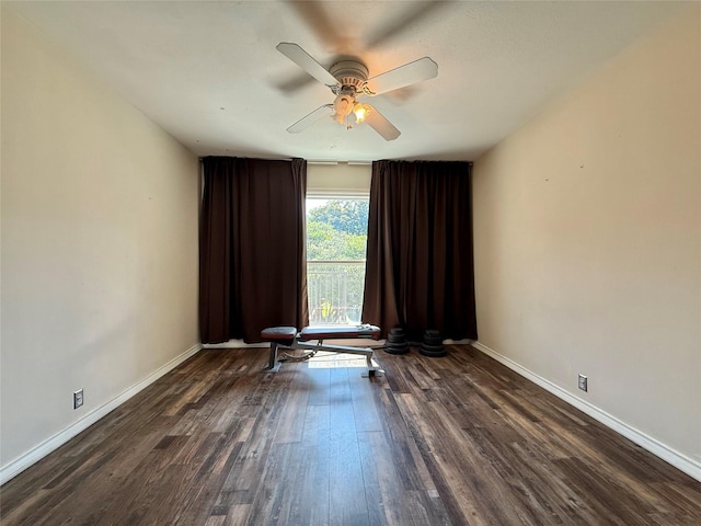 7830 Meadow Park Dr Unit 209, Dallas, TX 75230 - unfurnished room with dark wood-style flooring, baseboards, and ceiling fan