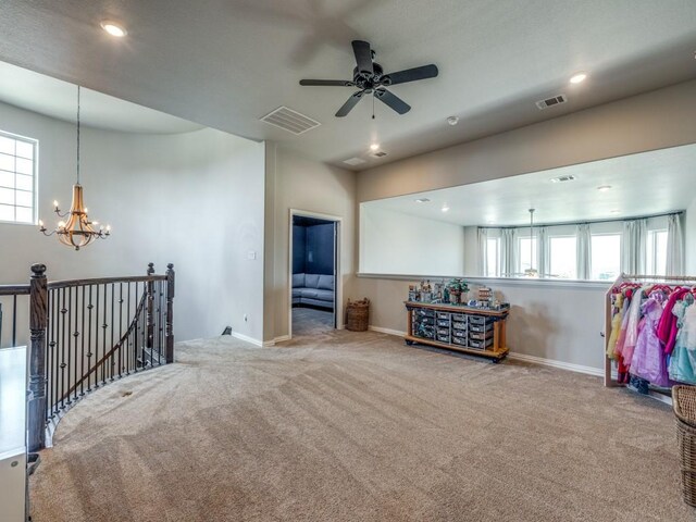 720 Lawndale St, Celina, TX 75009 - unfurnished living room featuring attic access, carpet flooring, a ceiling fan, a chandelier, and recessed lighting