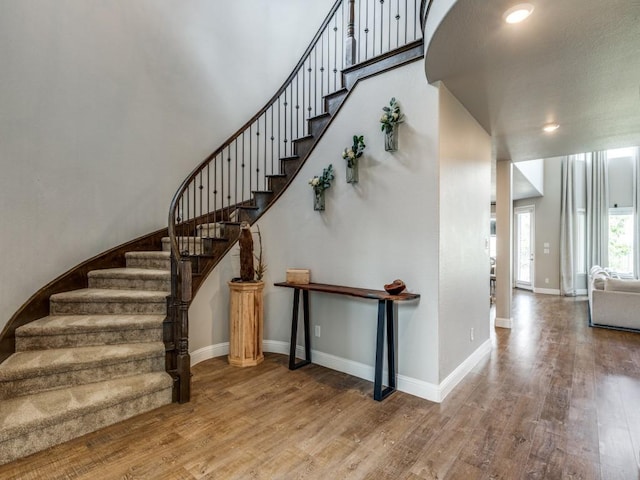 720 Lawndale St, Celina, TX 75009 - stairs featuring wood finished floors, baseboards, and recessed lighting
