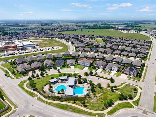 720 Lawndale St, Celina, TX 75009 - aerial view of property's location featuring a pool and nearby suburban area