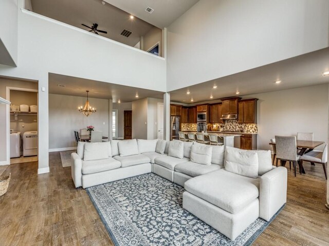 720 Lawndale St, Celina, TX 75009 - dining area with a chandelier, dark wood-style floors, baseboards, and french doors