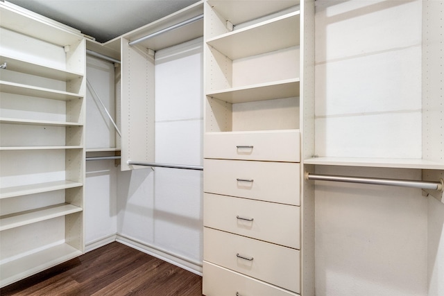 3208 Cole Ave Unit 2203, Dallas, TX 75204 - walk in closet featuring dark wood-style flooring