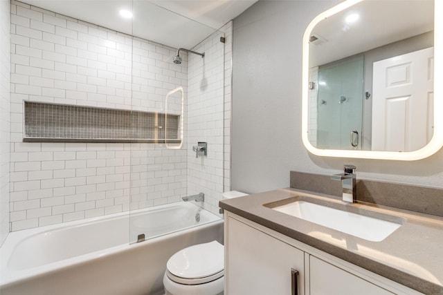 3208 Cole Ave Unit 2203, Dallas, TX 75204 - bathroom with toilet, vanity, and bathtub / shower combination