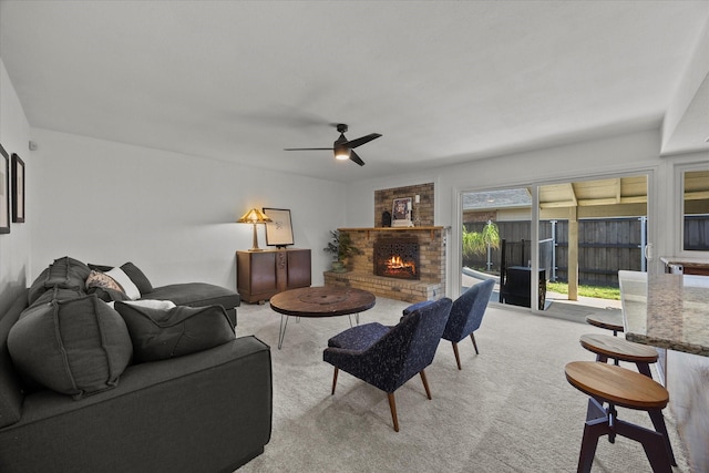4208 Crestover Dr, Mesquite, TX 75150 - living room featuring light carpet, a fireplace, and a ceiling fan