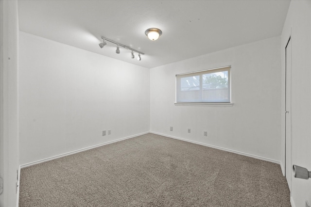 4208 Crestover Dr, Mesquite, TX 75150 - empty room with carpet and track lighting