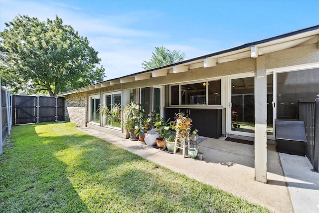 4208 Crestover Dr, Mesquite, TX 75150 - rear view of house featuring brick siding and a gate