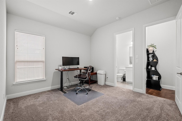 2705 Cumberland, The Colony, TX 75056 - office area featuring carpet floors, vaulted ceiling, and baseboards
