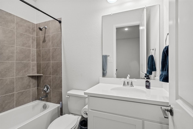 2705 Cumberland, The Colony, TX 75056 - full bathroom featuring toilet, vanity, a textured wall, and shower / bathtub combination