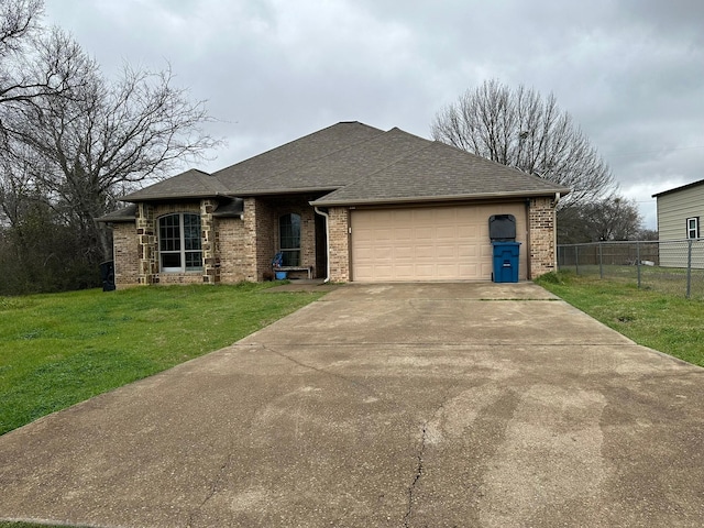 view of front of house with an attached garage, brick siding, driveway, and roof with shingles
