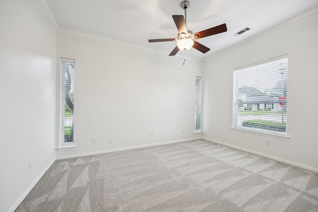 2401 Fountain Head Dr, Plano, TX 75023 - empty room featuring crown molding, light carpet, a ceiling fan, and baseboards