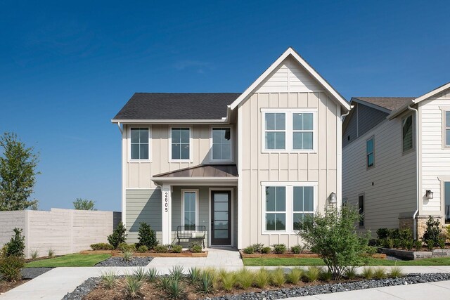 3124 Hoyle, Mckinney, TX 75071 - view of front of house featuring board and batten siding, a standing seam roof, and a shingled roof