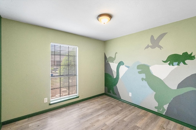 7817 Whirlwind Dr, Fort Worth, TX 76133 - unfurnished room featuring wood finished floors and baseboards