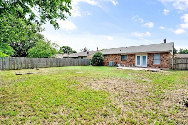 7817 Whirlwind Dr, Fort Worth, TX 76133 - view of yard featuring french doors, a patio area, and cooling unit