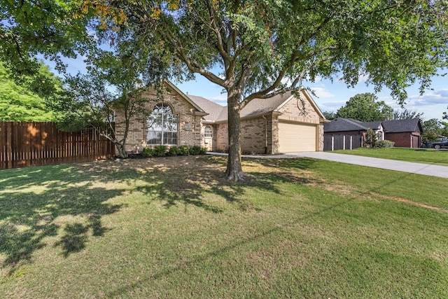3559 Kayewood Dr, Little Elm, TX 75068 - view of front of house with driveway, brick siding, and a garage