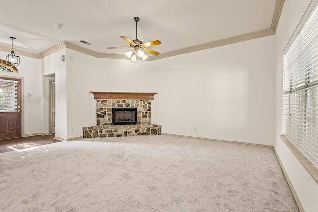 3559 Kayewood Dr, Little Elm, TX 75068 - unfurnished living room featuring carpet, ornamental molding, a ceiling fan, baseboards, and a fireplace