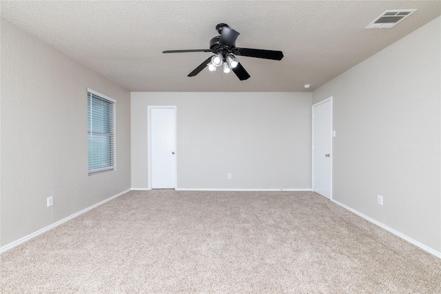 2133 Bliss Rd, Fort Worth, TX 76177 - carpeted spare room with a textured ceiling, a ceiling fan, and baseboards