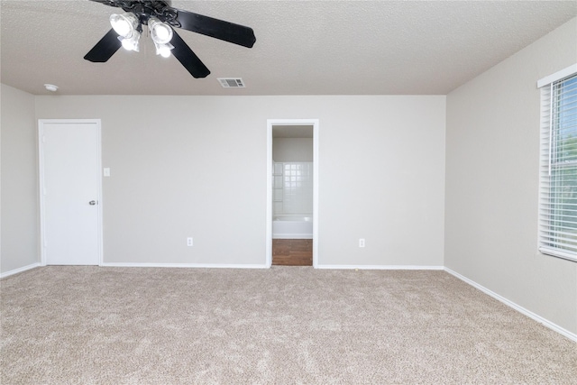 2133 Bliss Rd, Fort Worth, TX 76177 - carpeted empty room with ceiling fan, a textured ceiling, and baseboards