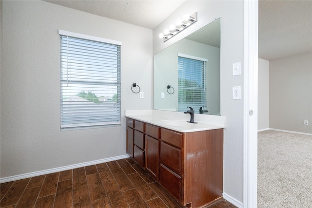 2133 Bliss Rd, Fort Worth, TX 76177 - bathroom with vanity, wood finished floors, and baseboards