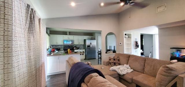 918 Greenbriar Dr, Garland, TX 75043 - living area with ceiling fan, dark wood-type flooring, and high vaulted ceiling